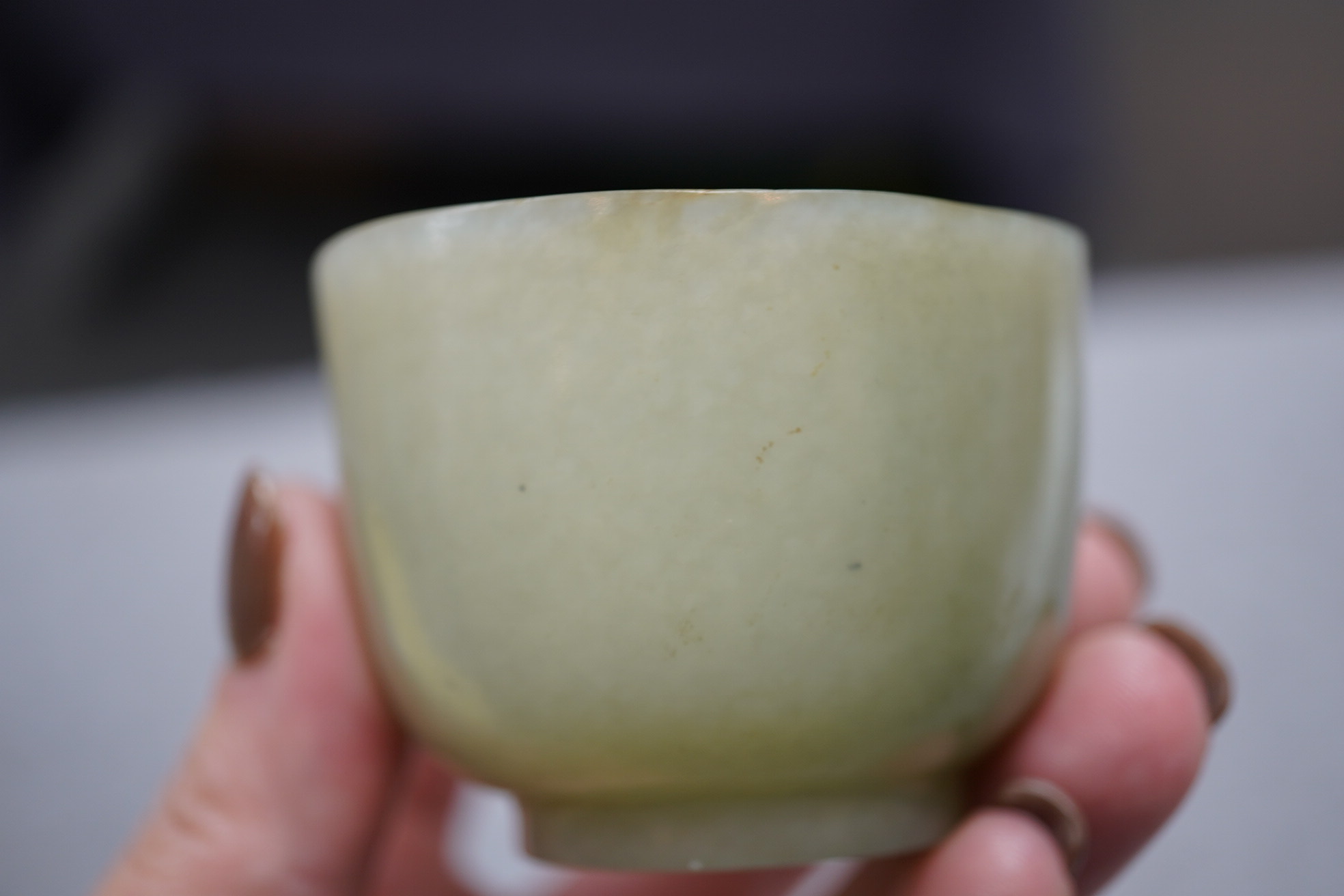 A Chinese pale celadon jade cup, 18th / 19th century